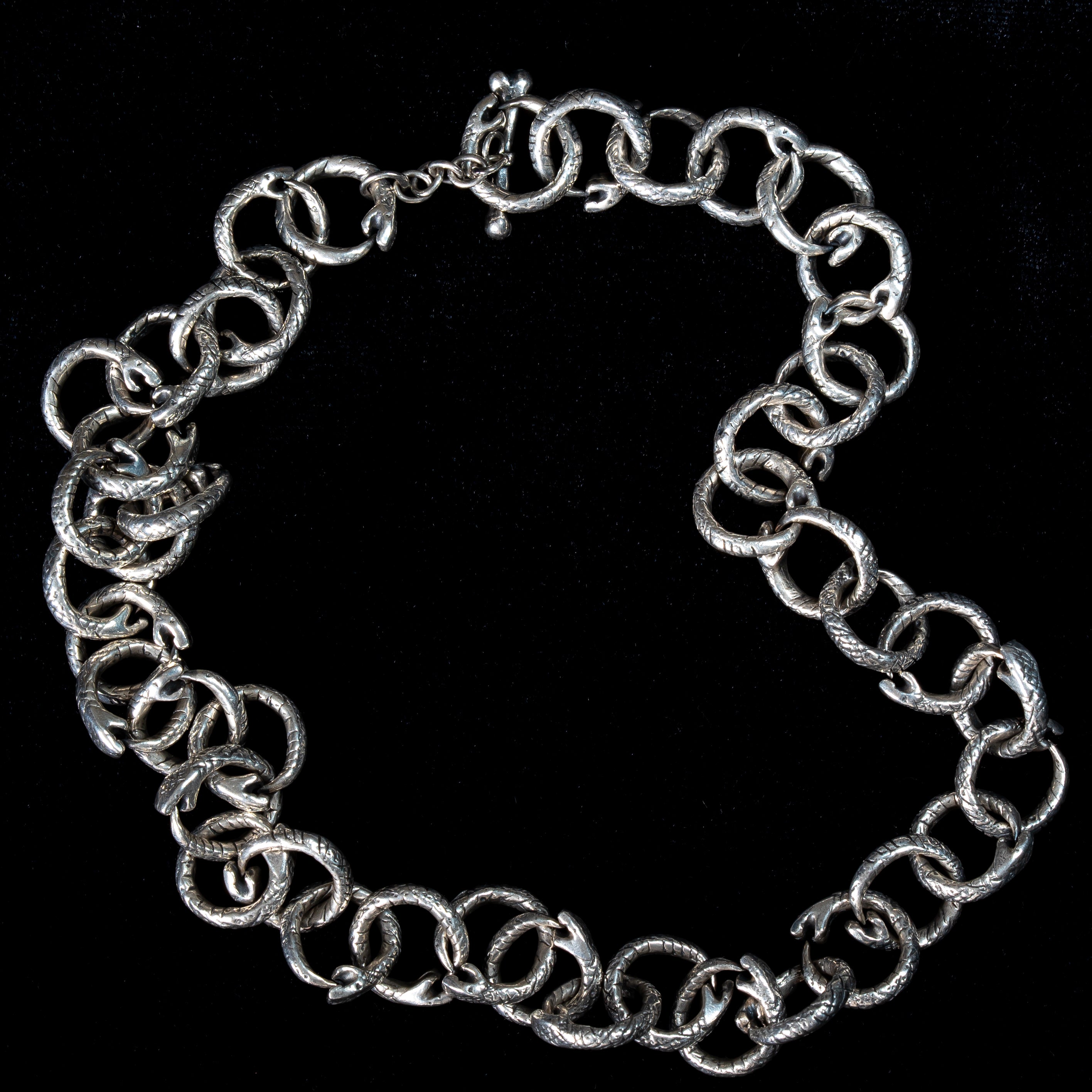 gothic handmade chunky chain necklace in sterling silver on  black background
