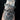 Two handmade snake bracelets, mens and women's sizes both worn on a tattooed female wrist