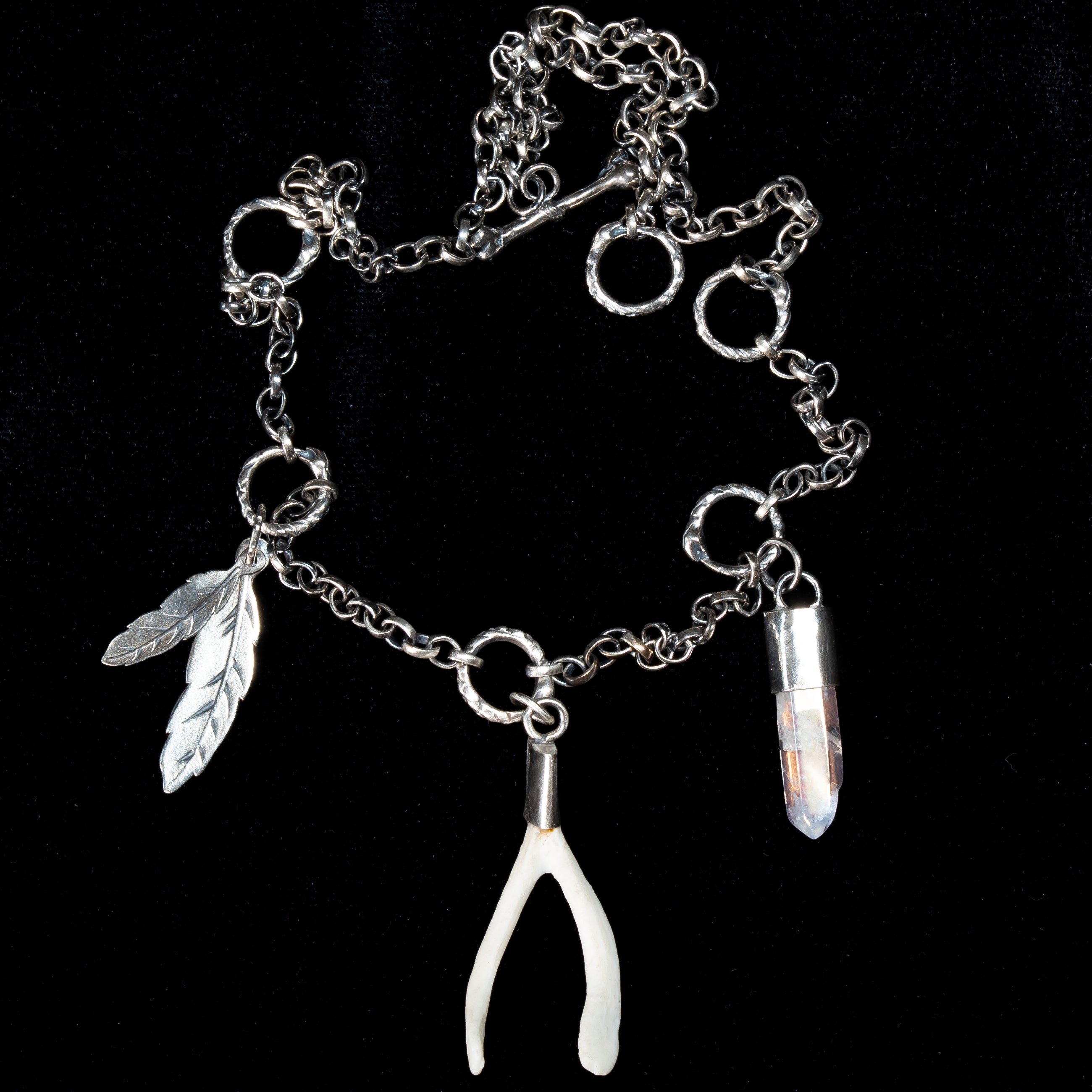 handmade one of a kind lucky charm  chain with lucky bonearrow, feather char and clear quartz