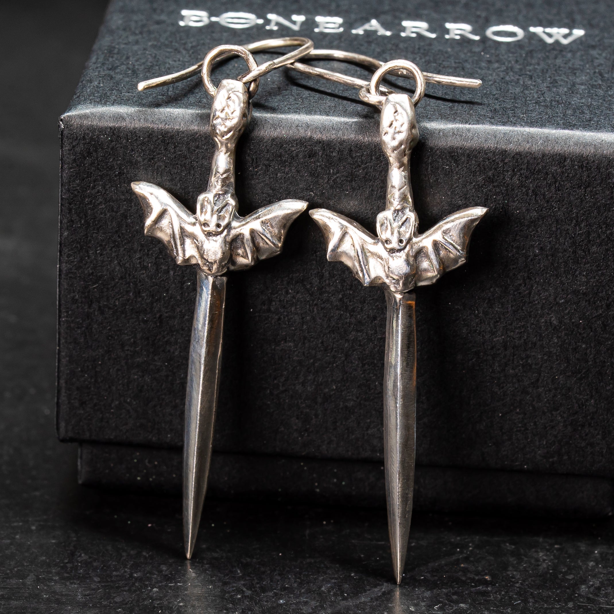 Two gothic sword earrings with bats