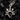 A black onyx pendant designed as a teardrop shape with silver bezel and skull motifs, accompanied by a baby snake link jump ring.