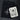 A black drawstring pouch with a white Bonearrow logo sits on a dark gray surface next to a stack of oracle cards. The top card, 'The Spider,' from the storm cloud oracle, features a black spider illustration.