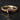 Gold engagement ring with heart shaped garnet and shoulders of scallop set garnets.
