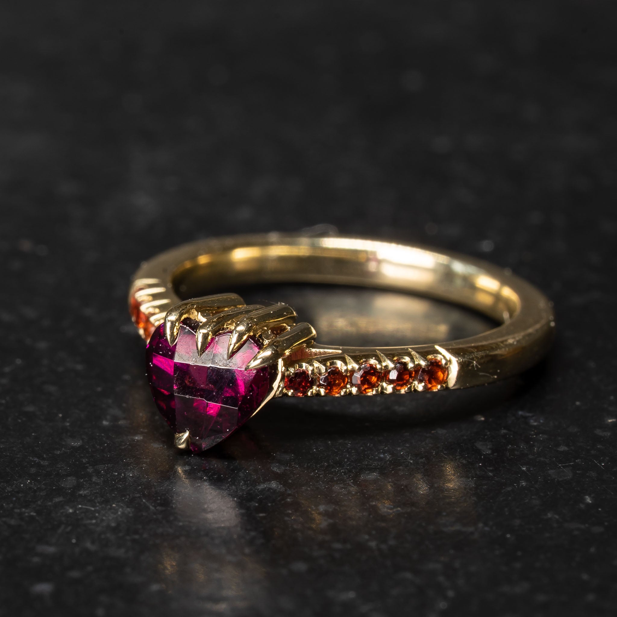 Unique handmade red garnet engagement ring made in Nottingham 