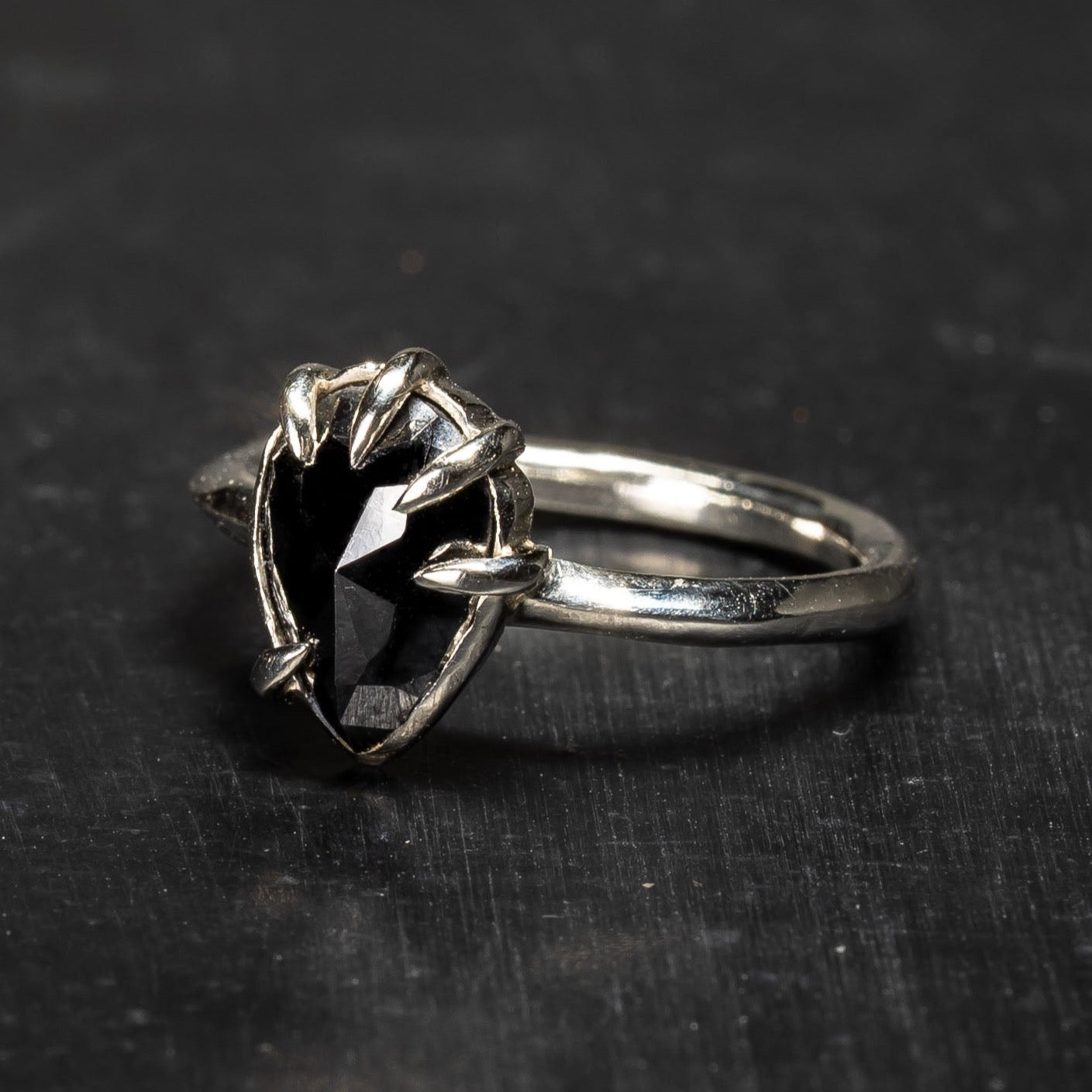 Darkly beloved collection engagement ring with pear shaped diamond