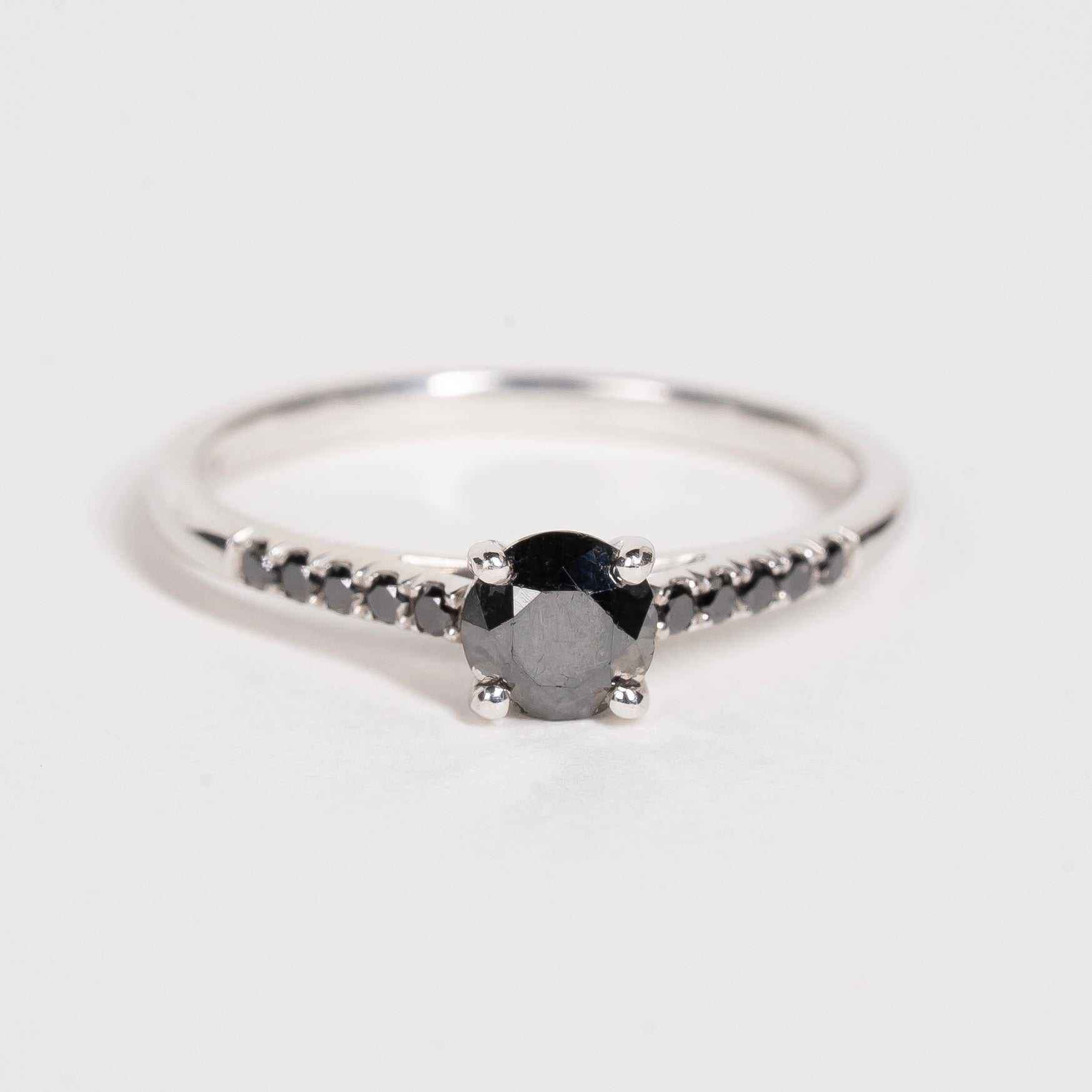 Alternative style engagement ring with black diamonds