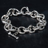  Unique silver bracelet made of individual snakes eating their own tails, otherwise known as the Ouroboros. Gothic style handmade jewellery.